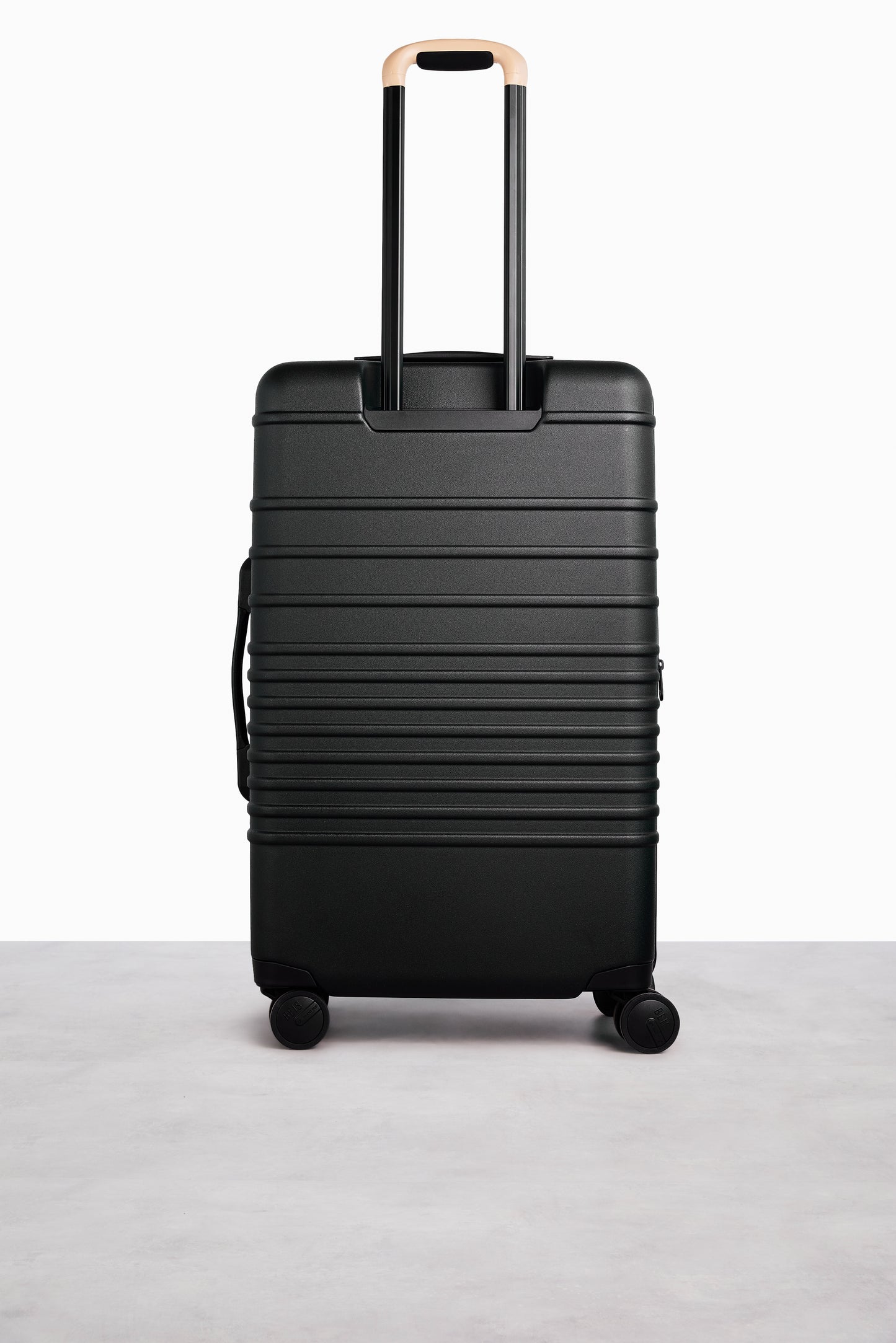 The 26" Check-In Roller in Black