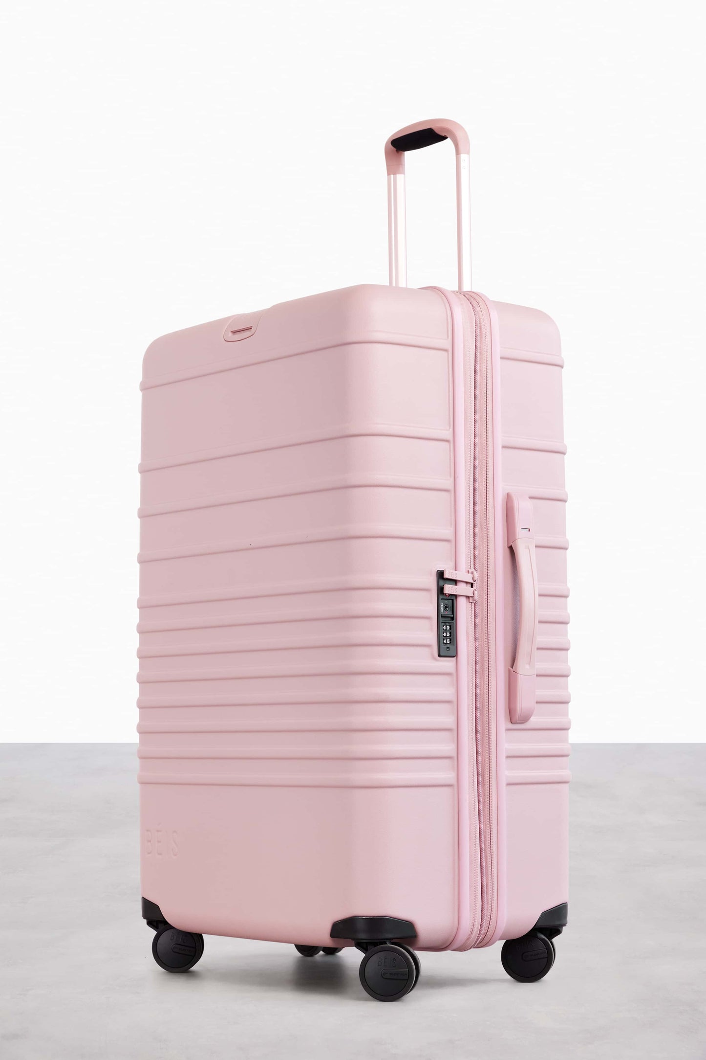 The 29" Large Check-In Roller in Atlas Pink