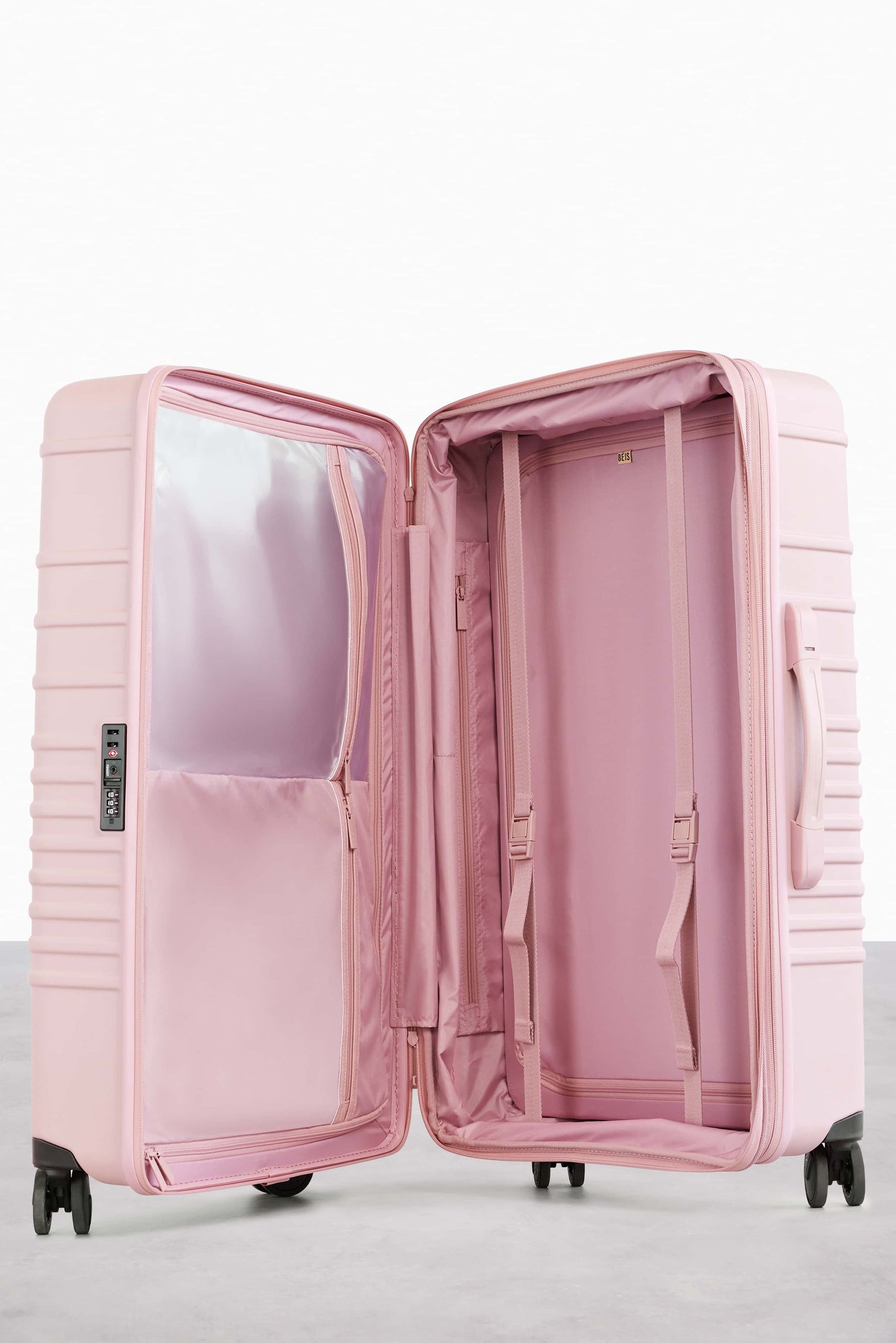 The 29" Large Check-In Roller in Atlas Pink