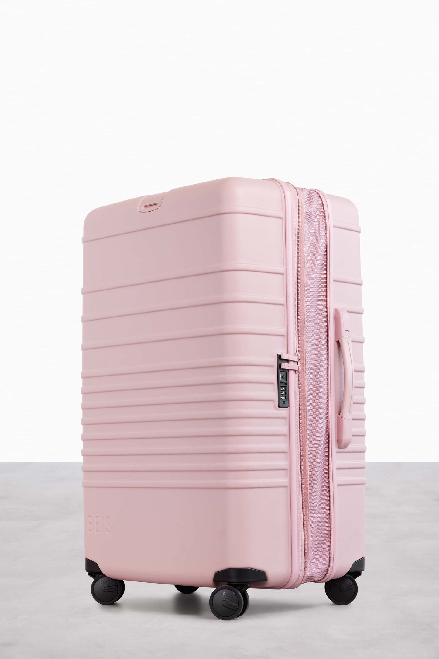 The 29" Large Check-In Roller in Atlas Pink